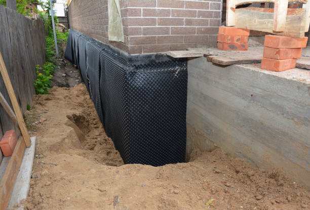 Happy homeowners after waterproofing job in Walhonding